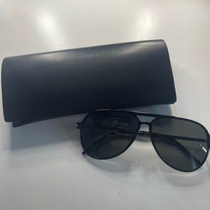 YSL Sunglasses in perfect condition, comes with case and cloth.